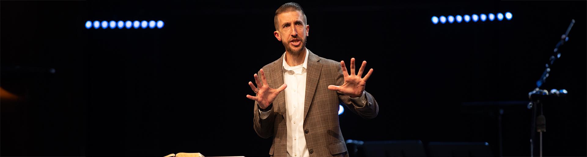 Dr. Jeremy Kimble preaching in chapel 1920